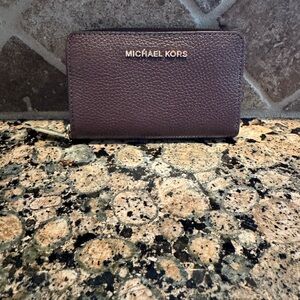 Michael Kors Burgundy Leather zip around wallet